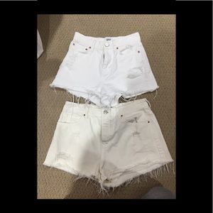 2 pairs of white shorts